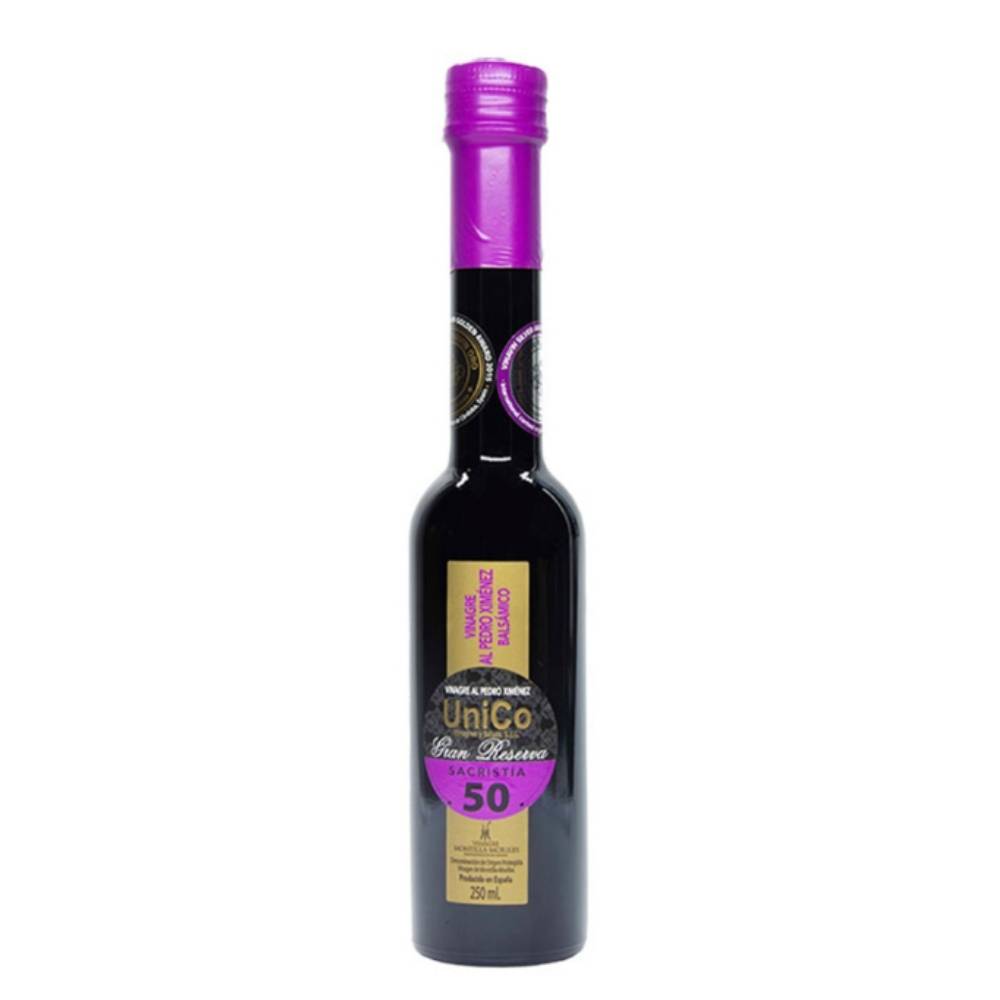 4660_UNICO_GRANRES_50_0001 dunkler Balsamico-Essig Sacristia Unico Gran Reserva 50 in schmaler dunkler Flasche mit violettem Schraubverschluss und Etikett